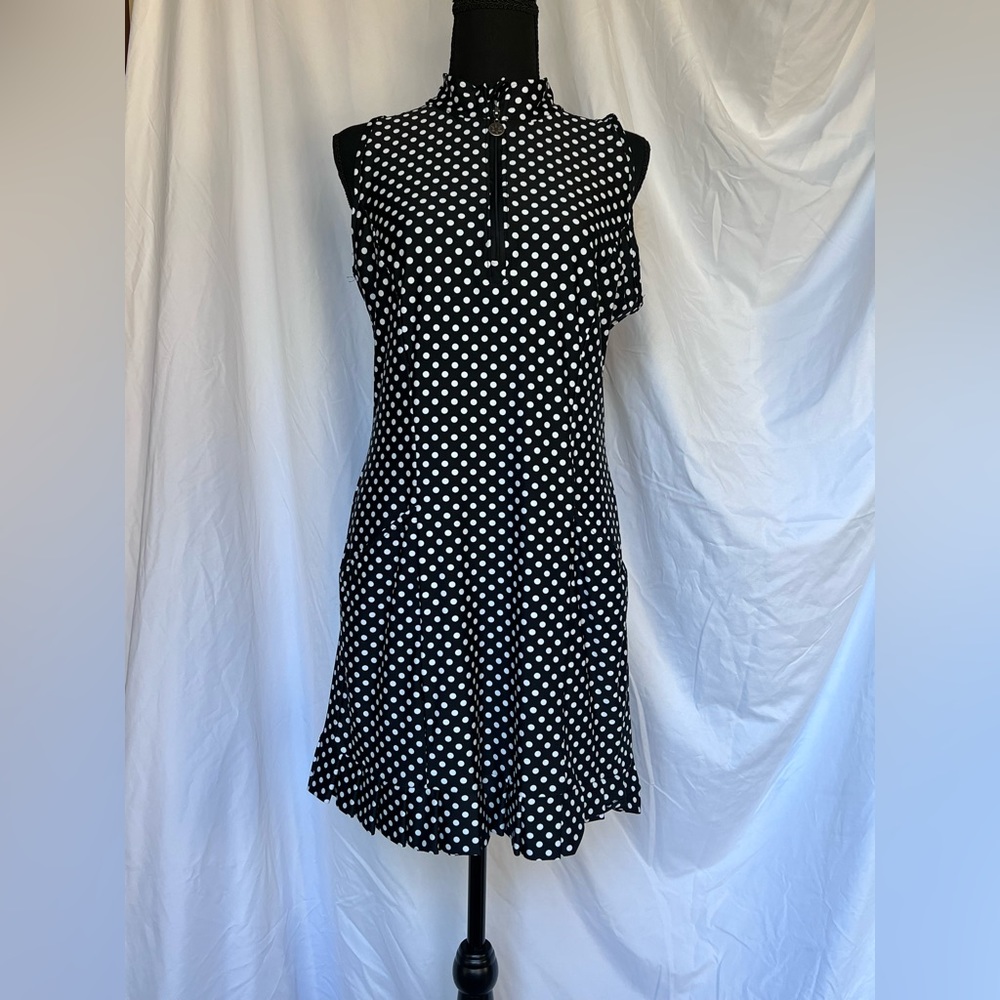 Tzu Tzu black and white polkadot golf dress. Black shorts included